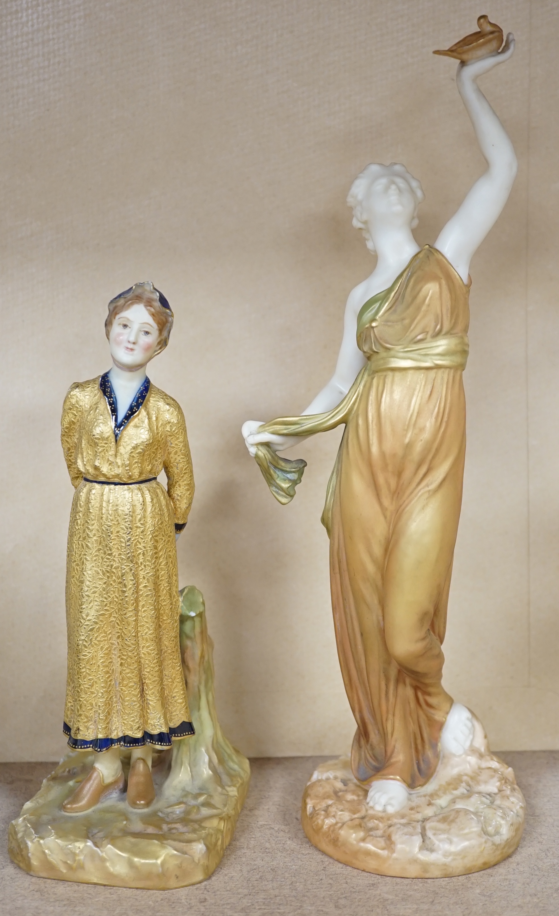 Two Royal Worcester partially gilt figurines including 2214, largest 16cm high. Condition - good